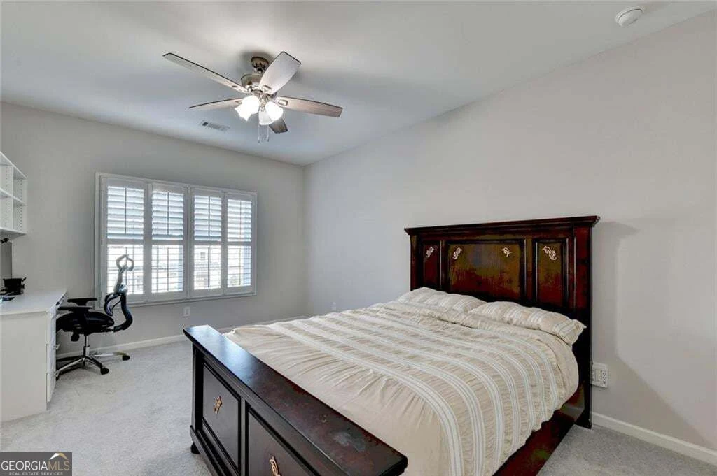 Primary bedroom with tray ceiling